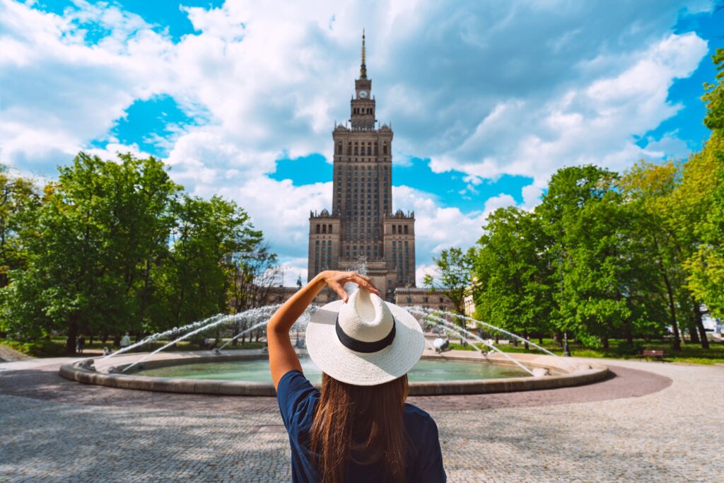 young tourist woman white sun hat walking park warsaw city poland 1